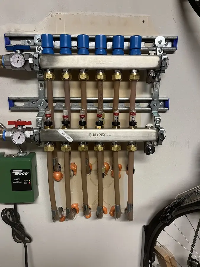 Plumber performing Water Heater Repair at a residential property in Hobbs