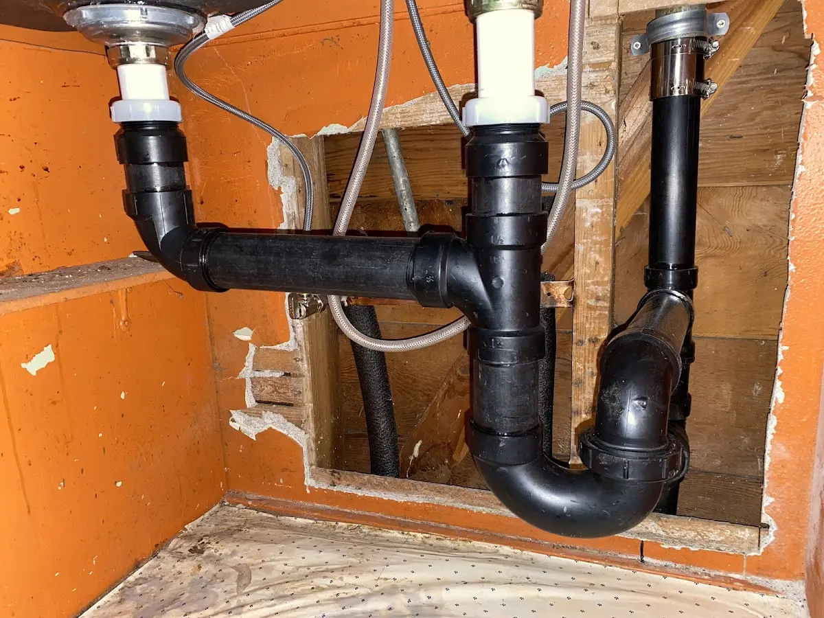 Professional Garbage Disposal Repair equipment and tools on the job in Hobbs